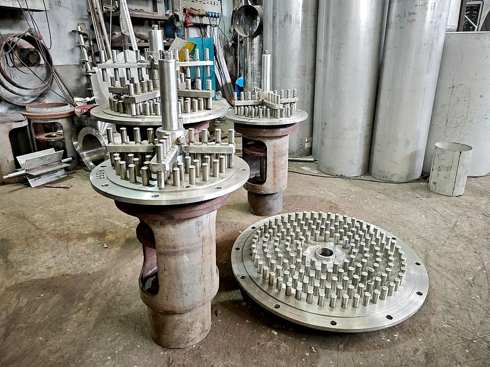 Pin mill rotors and pinned base plates for Acmefil spin flash dryers